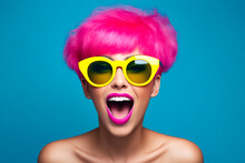 Woman with pink hair and yellow sunglasses on her face.