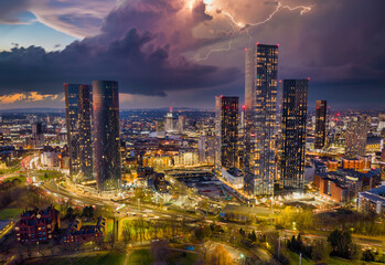 Manchester at dusk and lighting bolt over the skyline