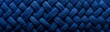 Knitted textured background, knitted or crocheted wool, textured knitted blue sweater or fabric.