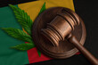Flag of Benin and justice gavel with cannabis leaf. Illegal growth of cannabis plant and drugs spreading