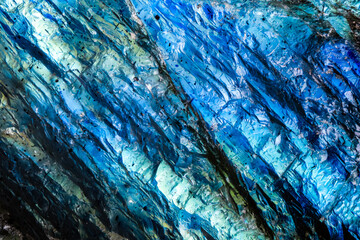 Wall Mural - Labradorite blue specimen close-up macro detail semi-precious gemstone texture uncut, unpolished rough raw