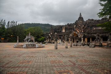 Wall Mural - Beautiful ancient Asian architecture. Stone elephants. It's a nasty day.