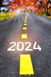 New year 2024 on road. Business recovery challenge concept and beginning success idea