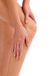 © Nobilior - Closeup shot of woman holding sore knee, isolated