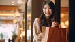 © pinkrabbit - Modern happy asian Female lifestyle fashion portrait. beautiful attractive young woman girl enjoy stylish walk with shopping bag packages on the department store, trendy outfit on shopping mall