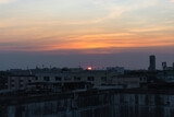 Fototapeta  - Sunset in Bangkok, Thailand, silhouette of big building in city with dramatic vanilla sky for background.