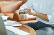 © Charlie's - Business man Looking at smart watch In Office online connect Gadget technology
