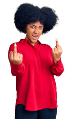 Poster - Young african american girl wearing casual clothes showing middle finger doing fuck you bad expression, provocation and rude attitude. screaming excited