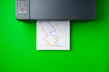 Modern printer with paper on green background