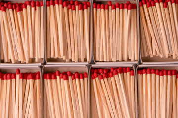 Boxes with new matchsticks as a background.