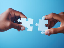 Hand Holding Blue Jigsaw Puzzle On Blue Background, Idea Solution Concept