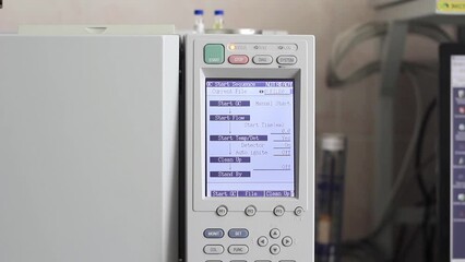 Control panel, digital display with numbers, letters and buttons