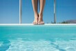 woman jumping in the pool. legs closeup