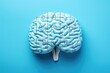 Puzzle brain on a blue background. Versatile image suitable for various applications