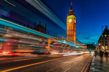 Fototapeta Big Ben - London Big Ben and Westminster Bridge with Palace of Westminster. Blurry people because of Long Exposure. Red bus in Motion