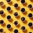 © DALU11 - American coffee cups on yellow background.