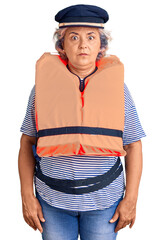 Sticker - Senior woman with gray hair wearing nautical lifejacket thinking attitude and sober expression looking self confident