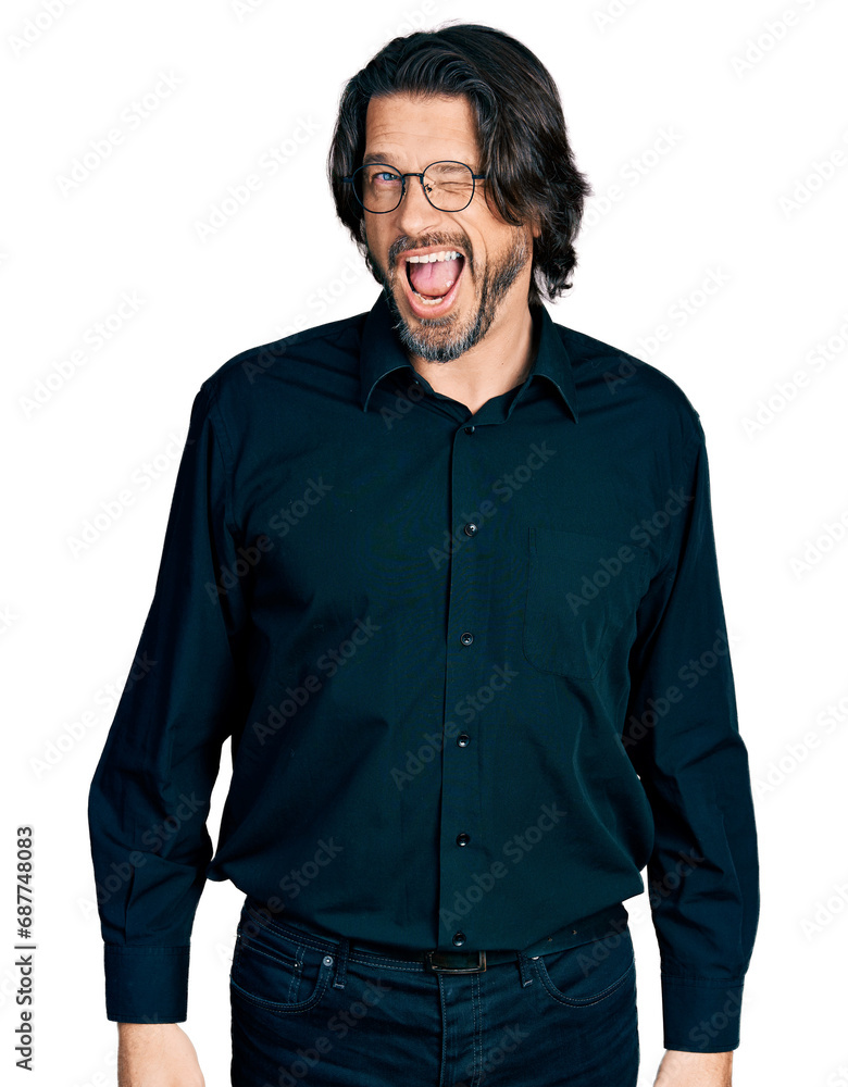 Middle age caucasian man wearing casual clothes and glasses winking looking at the camera with sexy expression, cheerful and happy face.
