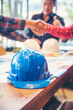 © aFotostock - Civil Construction engineer teams shaking hands together wear work helmets worker on construction site. Foreman industry project working engineer teamwork. Two asian engineer team shake hands together
