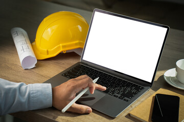 Wall Mural - freelancer typing on laptop laptop with blank screen on table. workspace background copy space scree