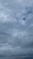 Sticker - Dramatic sky with storm cloud on a cloudy day time lapse.