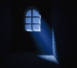 Wall Mural - Light in the window of a dungeon in a stone old castle.