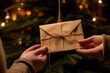 Letter to Santa Claus. Woman hand holding and receiving a craft envelope eve festal day at decorated christmas home indoors.  Christmas postal service concept.