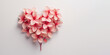 concept: ecology, holidays, Valentine's day, March 8, love, banner. delicate pink and red spring flower in the shape of a heart on a plain background