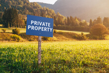 Private Property Information Signboard In Countryside Meadow Landscape