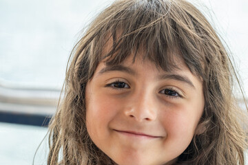 Canvas Print - Smiling face of a young girl