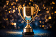 © Александр Довянский - Gold winner cup trophy on dark background under spotlights with abstract shiny gold and blue lights