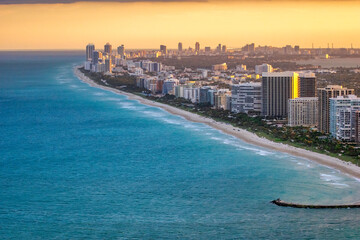 Wall Mural - Sunset aerial view of Miami from helicopter, Florida