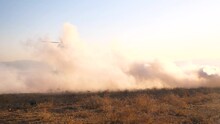 Israeli Blackhawk Helicopter landing in Gaza on field designated by smoke