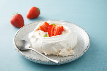 Canvas Print - Traditional Pavlova dessert with fresh strawberry