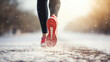 Woman with red sports shoes running in snow in winter
