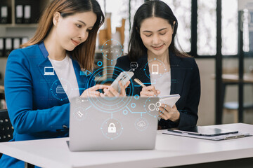 Wall Mural - Person using smartphone, tablet  with SDK icon on virtual screen. SDK Software development kit programming language technology concept in office.