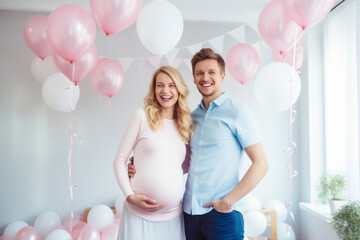 Beautiful young expecting couple surrounded by pink and blue balloons, confetti and streamers as a decorations at a gender reveal or a baby shower party.