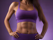 © Jira - Close up of perfect abdominal muscles of fitness woman in purple sports bra, unrecognizable sexy sportswoman posing on purple background, concept of fitness, sports and perfect body, health food
