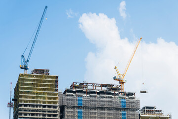 Wall Mural - View of the building construction site with cranes in Taiwan.