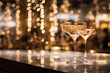 Selective focus, colourless cocktail with fancy decorated glass on countertop of cocktail bar and blur background of luxury elegant golden vibe bar.