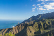 © Create.Pictures - Mirador Risco Magoje with a view of the volcanic island and the sea. Santa Cruz de Tenerife, Spain. Mountain landscape terrain against the background of the blue sky