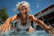 elderly happy woman swimming in the pool on vacation