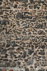 Poster - Old black stone wall closeup