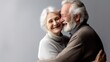 Old senior couple in love hug and embrace with romance together close-up portrait background. Hug Day, St Valentines concept. Happy mature man and woman hugging together. Elderly people in love..