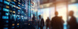 Blurred scene of people in a city looking at a digital stock market display, indicating real-time trading data with glowing numerical values.