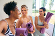 © Monkey Business - Three Mature Female Friends In Fitness Clothing Meeting At Gym Or Yoga Class