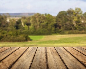 Wall Mural - the empty wooden table top at farm background