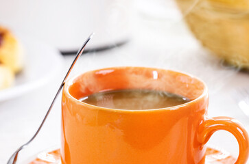 Wall Mural - milk with coffee, traditional Brazilian breakfast drink, served hot with bread and toast