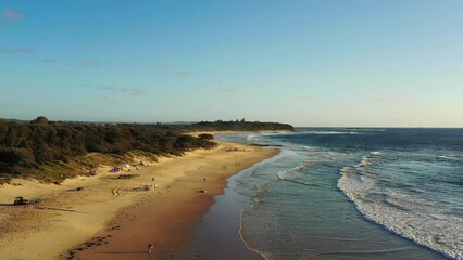 Sticker - Wide relaxing sandy beach in Caves beach town on Pacific coast of Australia.
