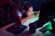 © Krakenimages.com - Young beautiful hispanic woman streamer stressed using computer at gaming room
